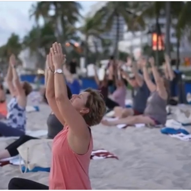 People exercising on beach